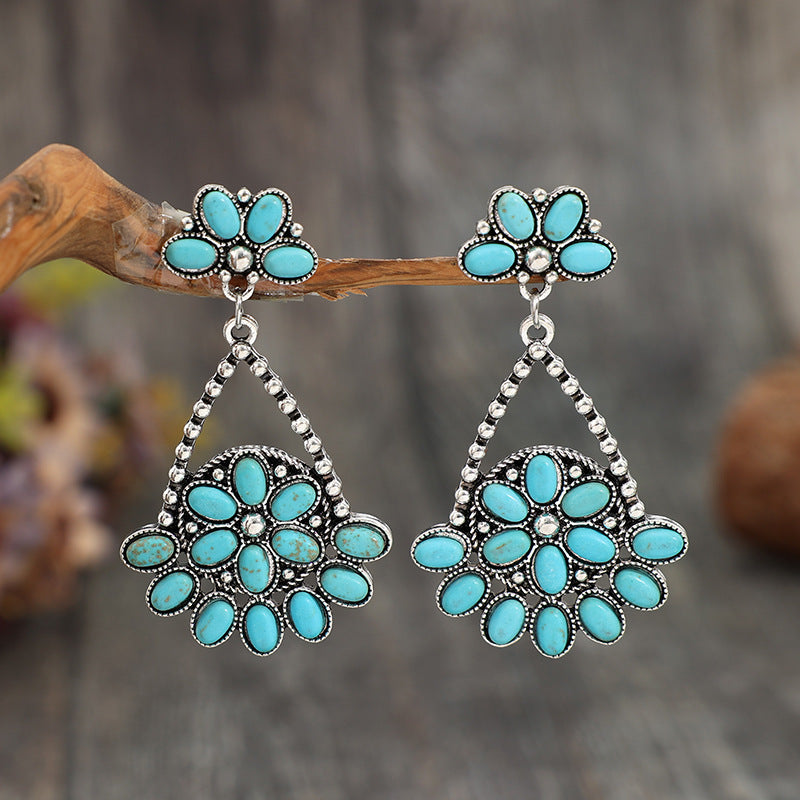 Front view of the Bohemian Turquoise Teardrop Earrings with artificial turquoise stones in a classic teardrop shape.