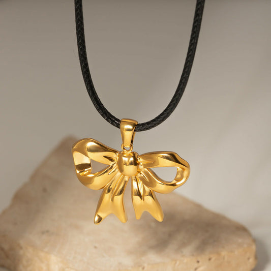 Luxe 18K Gold Plated Bow Pendant Necklace with a delicate bow design.