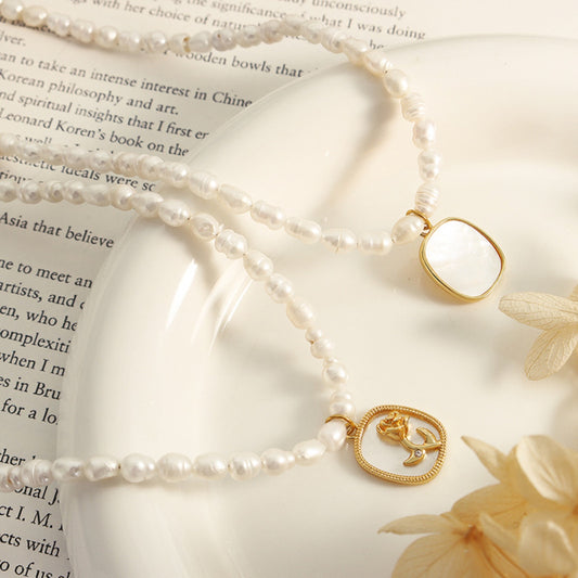 Luxe 18K Gold Plated Freshwater Pearl Necklace featuring lustrous pearls with gold accents.