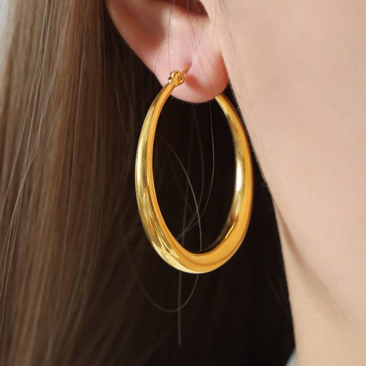 Luxe 18K Gold Plated Hoop Earrings featuring a sleek, polished gold hoop design.