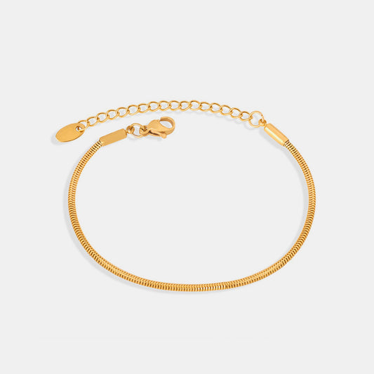 Luxe 18K Gold Plated Minimalist Bracelet featuring a sleek, simple design with 18K gold plating.