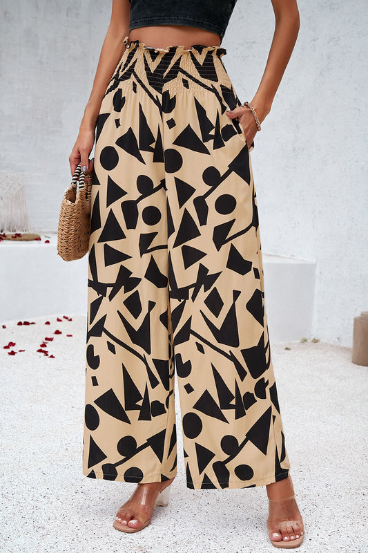 Front view of the Printed Smocked Wide-Leg Pants featuring a bold print and comfortable smocked waistband.