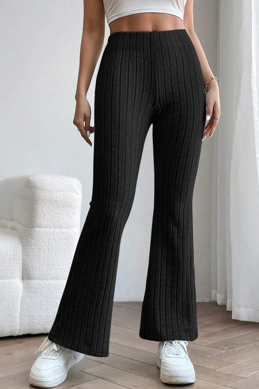 Front view of the Ribbed High-Waist Flare Pants featuring a high waist and ribbed texture in a chic flared design.