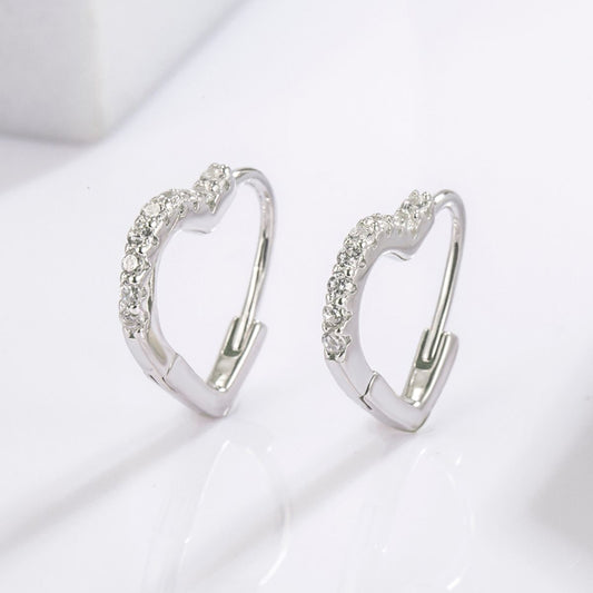 Sterling Silver Zircon Heart Earrings with a delicate heart-shaped design and sparkling zircon stones.